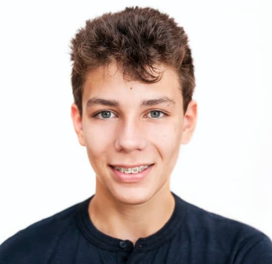 Illustrative photograph of a teen wearing metal braces, recovered from the original website